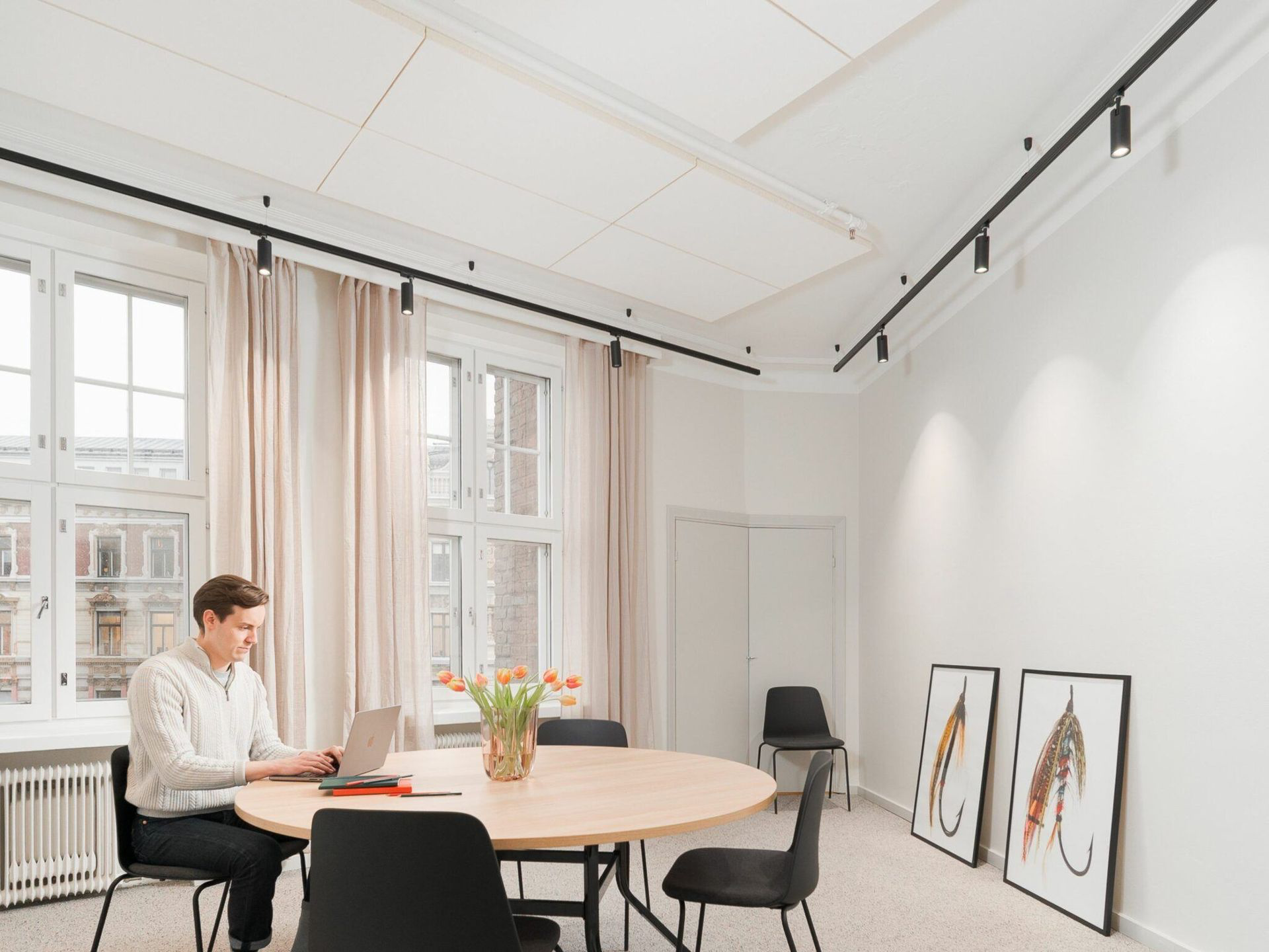 1200x600mm Aisti acoustic tiles glued to an office ceiling